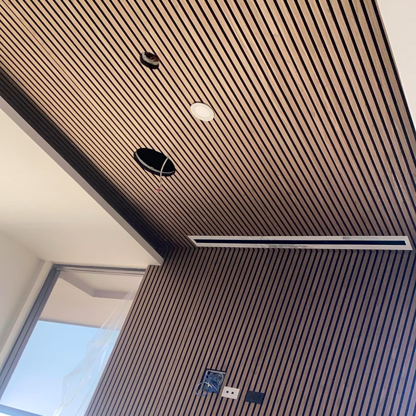 Ceiling Elevated with our Walnut Acoustic Akupanels